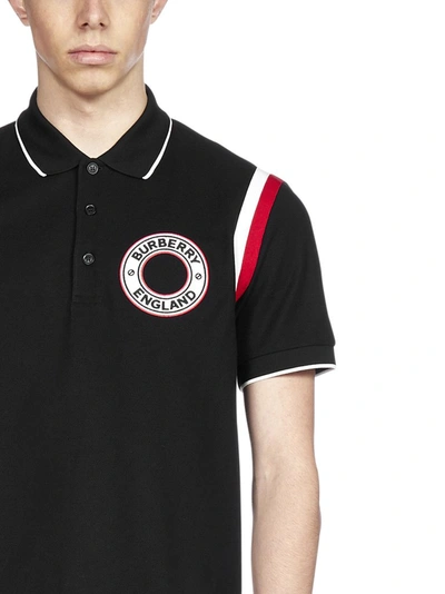 Shop Burberry Logo Appliqué Polo Shirt In Black