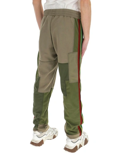 Shop Palm Angels Logo Printed Patchwork Track Pants In Green