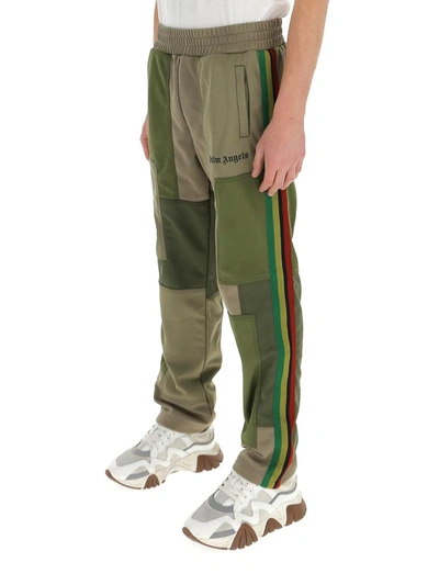 Shop Palm Angels Logo Printed Patchwork Track Pants In Green