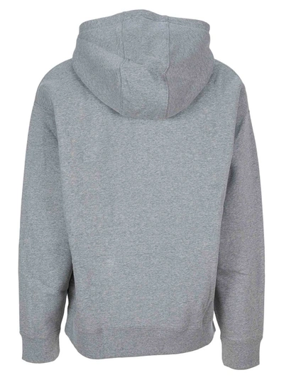 Shop Nike Logo Embroidered Drawstring Hoodie In Grey