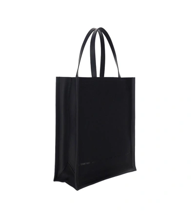 Shop Alexander Mcqueen Logo Print Top Handle Tote Bag In Black