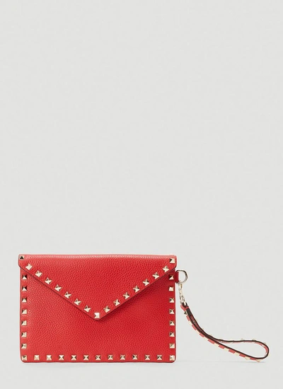 Shop Valentino Garavani Rockstud Medium Envelope Pouch Bag In Red