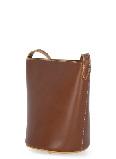 Shop Marni Contrast Trim Bucket Bag In Brown