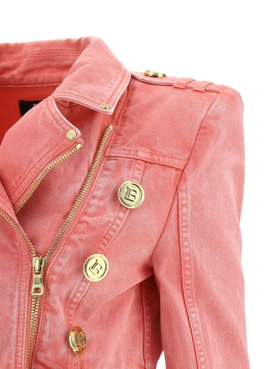 Shop Balmain Cropped Denim Biker Jacket In Pink