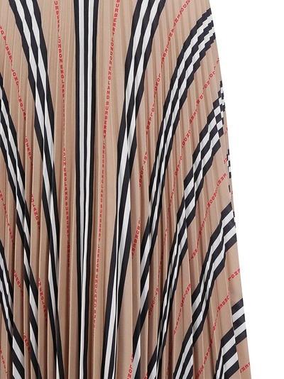 Shop Burberry Icon Stripe Pleated Midi Skirt In Beige