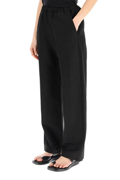 Shop Totême Wide Leg Trousers In Black