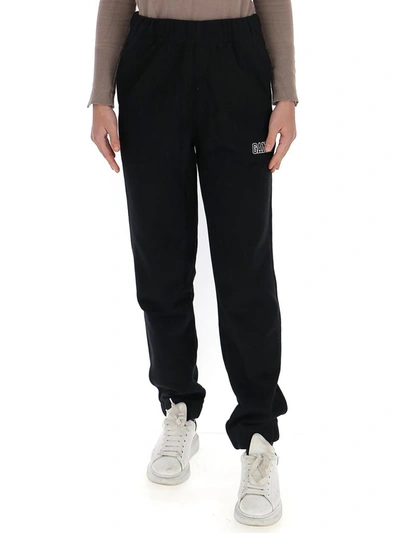 Shop Ganni Logo Embroidered Elasticated Waistband Sweatpants In Black