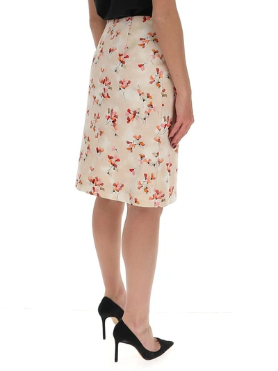Shop Prada Floral Printed Midi Skirt In Beige