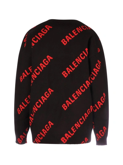 Shop Balenciaga Allover Logo Knit Sweater In Black