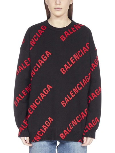 Shop Balenciaga Allover Logo Knit Sweater In Black