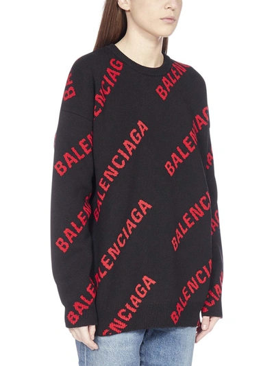 Shop Balenciaga Allover Logo Knit Sweater In Black