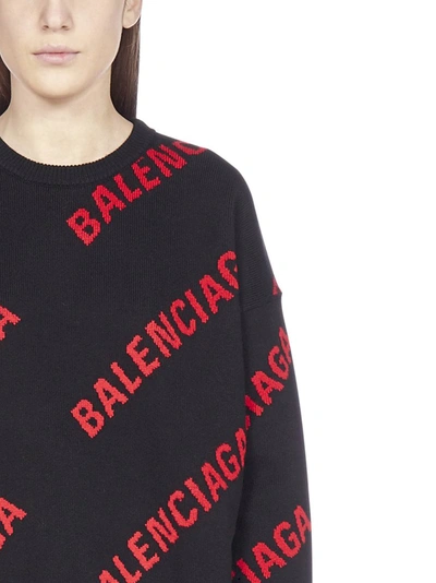 Shop Balenciaga Allover Logo Knit Sweater In Black