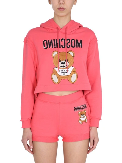 Shop Moschino Teddy Cropped Hooded Sweatshirt In Pink