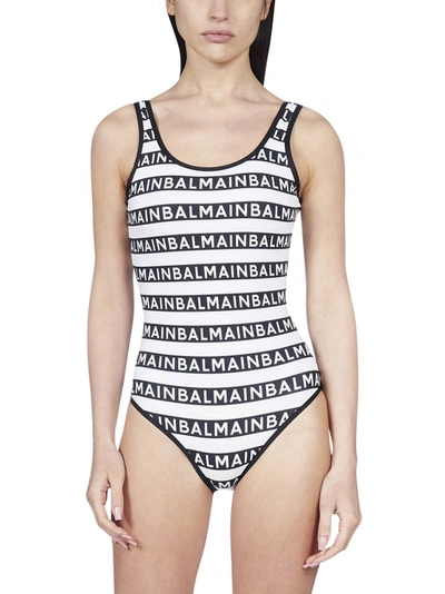 Shop Balmain Logo Print Striped Swimsuit In Multi