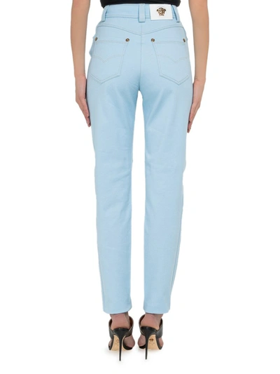 Shop Versace High Waisted Jeans In Blue