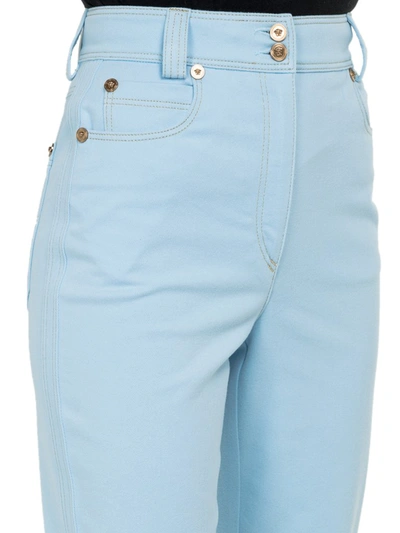 Shop Versace High Waisted Jeans In Blue