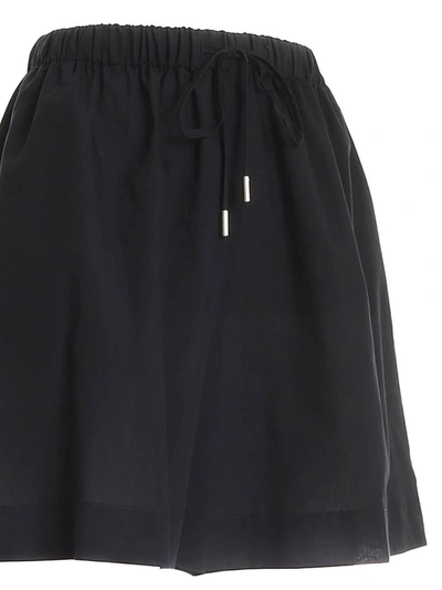 Shop Max Mara Beachwear Flared Drawstring Shorts In Black