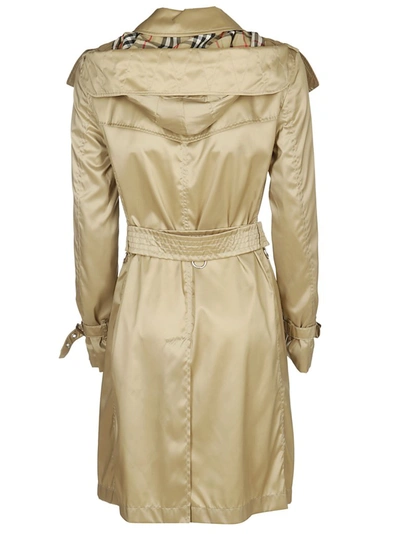 Shop Burberry Double Breasted Belted Trench Coat In Beige