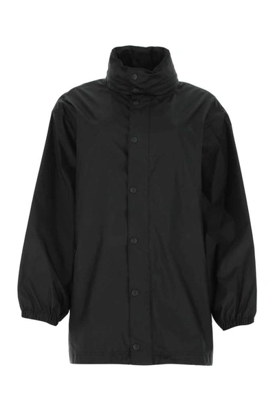 Shop Balenciaga Languages Print Raincoat In Black