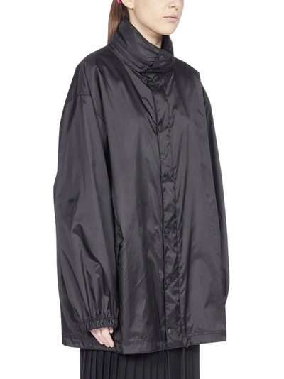Shop Balenciaga Languages Print Raincoat In Black