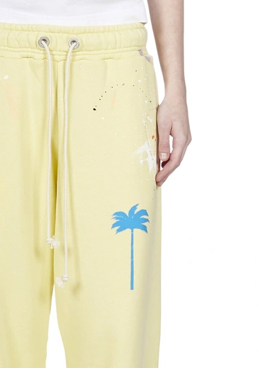 Shop Palm Angels Palm Tree Paint Splatter Sweatpants In Yellow