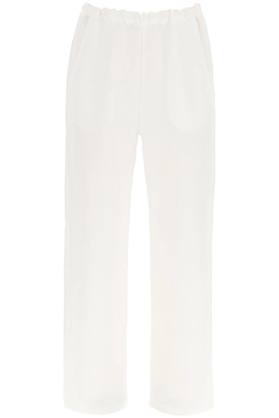 Shop Totême Wide Leg Trousers In White