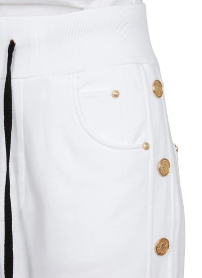 Shop Balmain Button Detail Track Pants In White