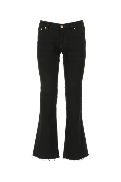 Shop Balenciaga Frayed Hem Flared Jeans In Black