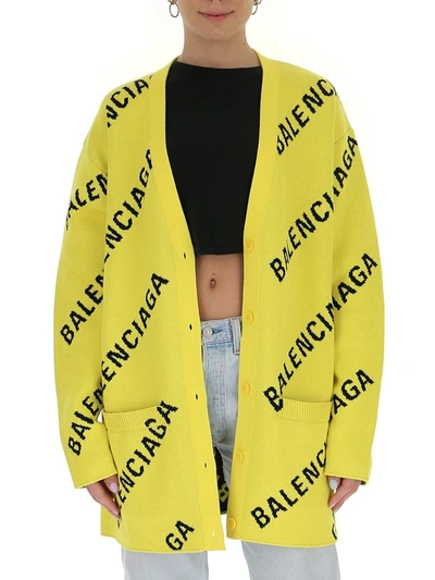 Shop Balenciaga Allover Logo Knitted Cardigan In Yellow