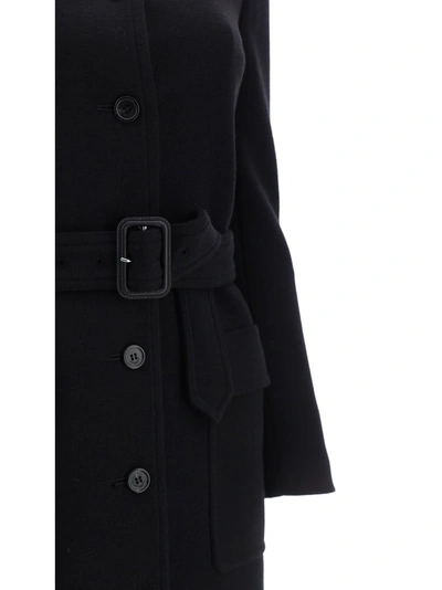 Shop Saint Laurent Belted Long Jacket In Black