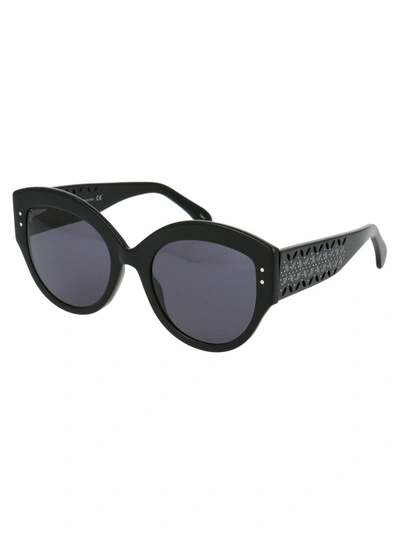 Shop Alaïa Oversized Cat Eye Frame Sunglasses In Black