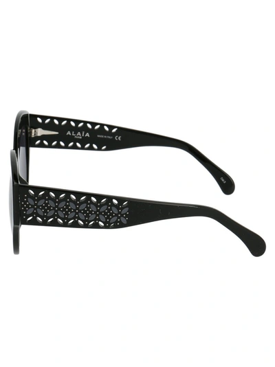 Shop Alaïa Oversized Cat Eye Frame Sunglasses In Black