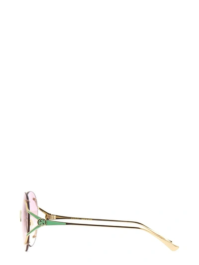 Shop Gucci Eyewear Round Frame Sunglasses In Gold