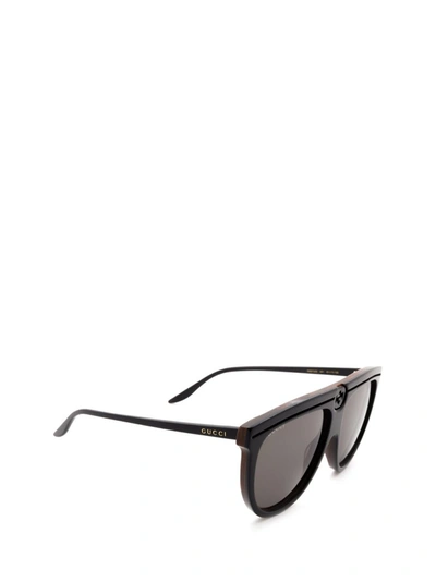 Shop Gucci Eyewear Flat In Black