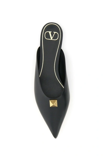 Shop Valentino Garavani Roman Stud Flat Mules In Black