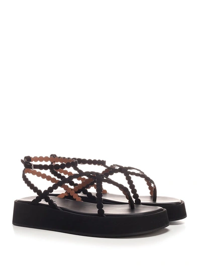 Shop Alaïa Interlaced Straps Platform Sandals In Black