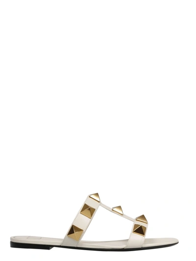 Shop Valentino Garavani Roman Stud Flat Sandals In White