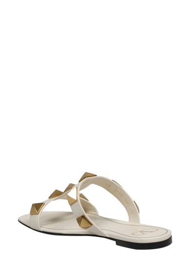 Shop Valentino Garavani Roman Stud Flat Sandals In White