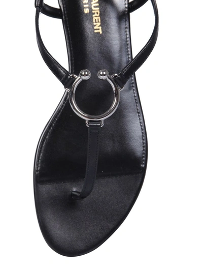 Shop Saint Laurent Ring Detail Thong Sandals In Black