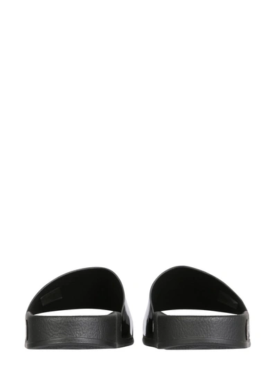 Shop Balmain Embossed Logo Slide Sandals In Black