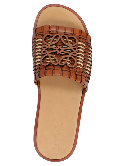 Shop Loewe Anagram Interwoven Sandals In Brown