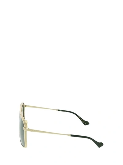 Shop Gucci Eyewear Aviator Sunglasses In Gold