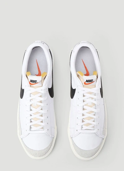 Shop Nike Blazer Low '77 Vintage Sneakers In White