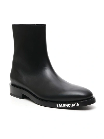 Shop Balenciaga Logo Sole Ankle Boots In Black