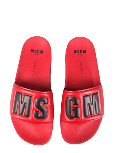 Shop Msgm Logo Embossed Slide Sandals In Red