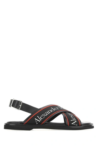 Shop Alexander Mcqueen Logo Crossover Sandals In Black
