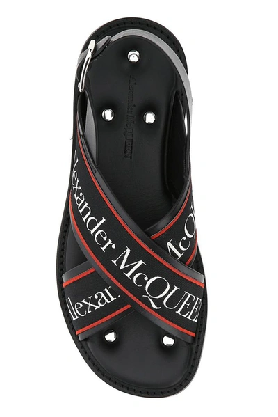 Shop Alexander Mcqueen Logo Crossover Sandals In Black