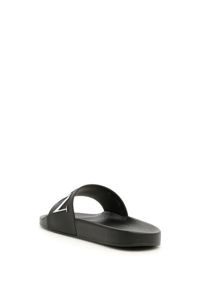 Shop Valentino Vltn Embossed Slides In Black