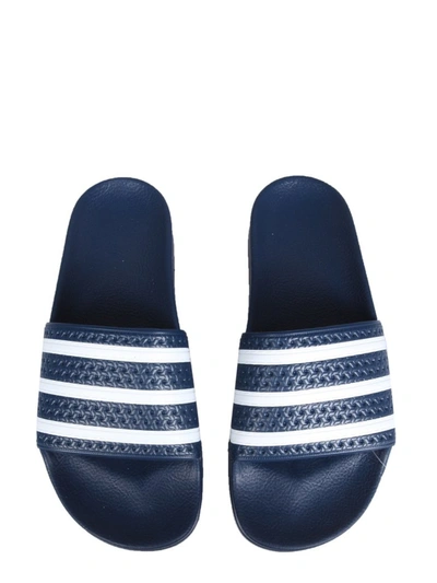 Shop Adidas Originals Adilette Slide Sandals In Blue