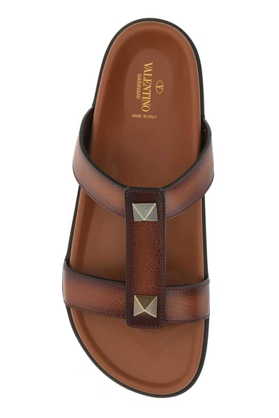 Shop Valentino Garavani Roman Stud Flat Sandals In Brown